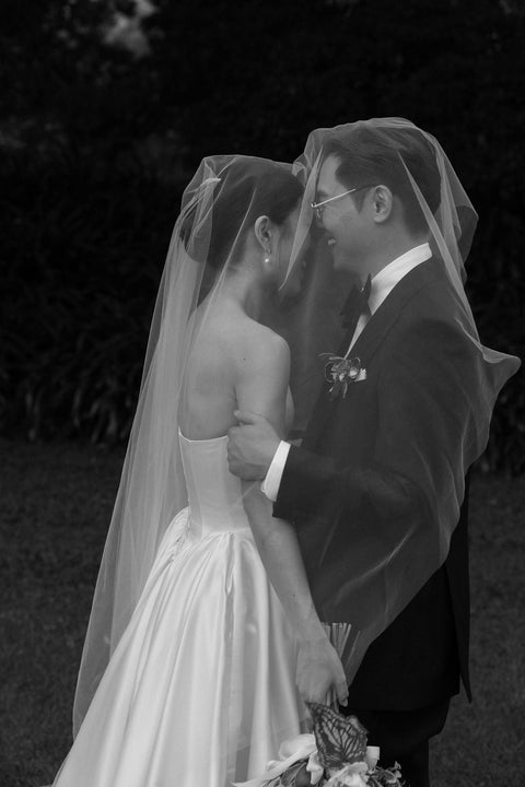 A dreamy couple exchange their vows amongst dreamy florals